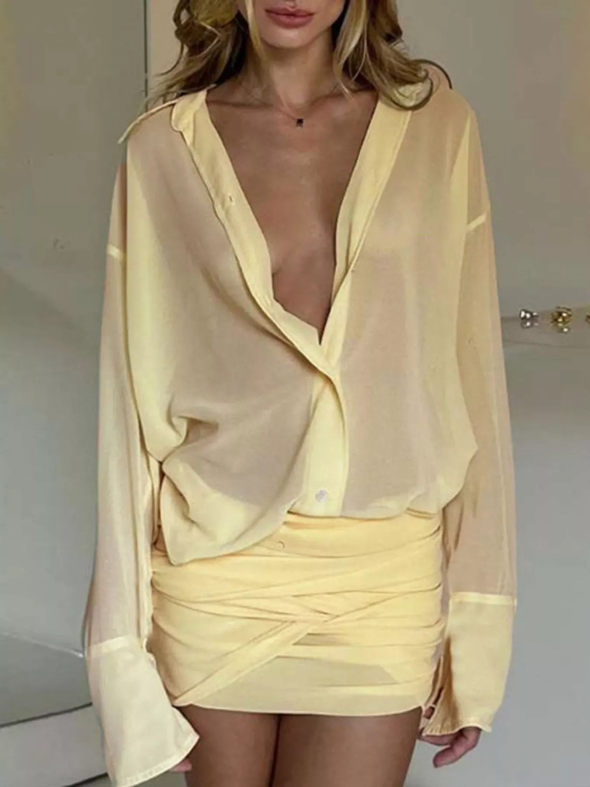Trendsi Sheer Button-Down Mini Shirt Dress with Back Tie Sheer Button-Down Mini Shirt Dress with Back Tie Apparel & Accessories > Clothing > Dresses
