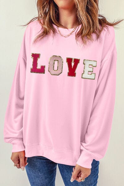 Trendsi Blush Pink / S LOVE Patch Round Neck Dropped Shoulder Sweatshirt 100100345773725 Apparel &amp; Accessories &gt; Clothing &gt; Sleepwear &amp; Loungewear &gt; Robes